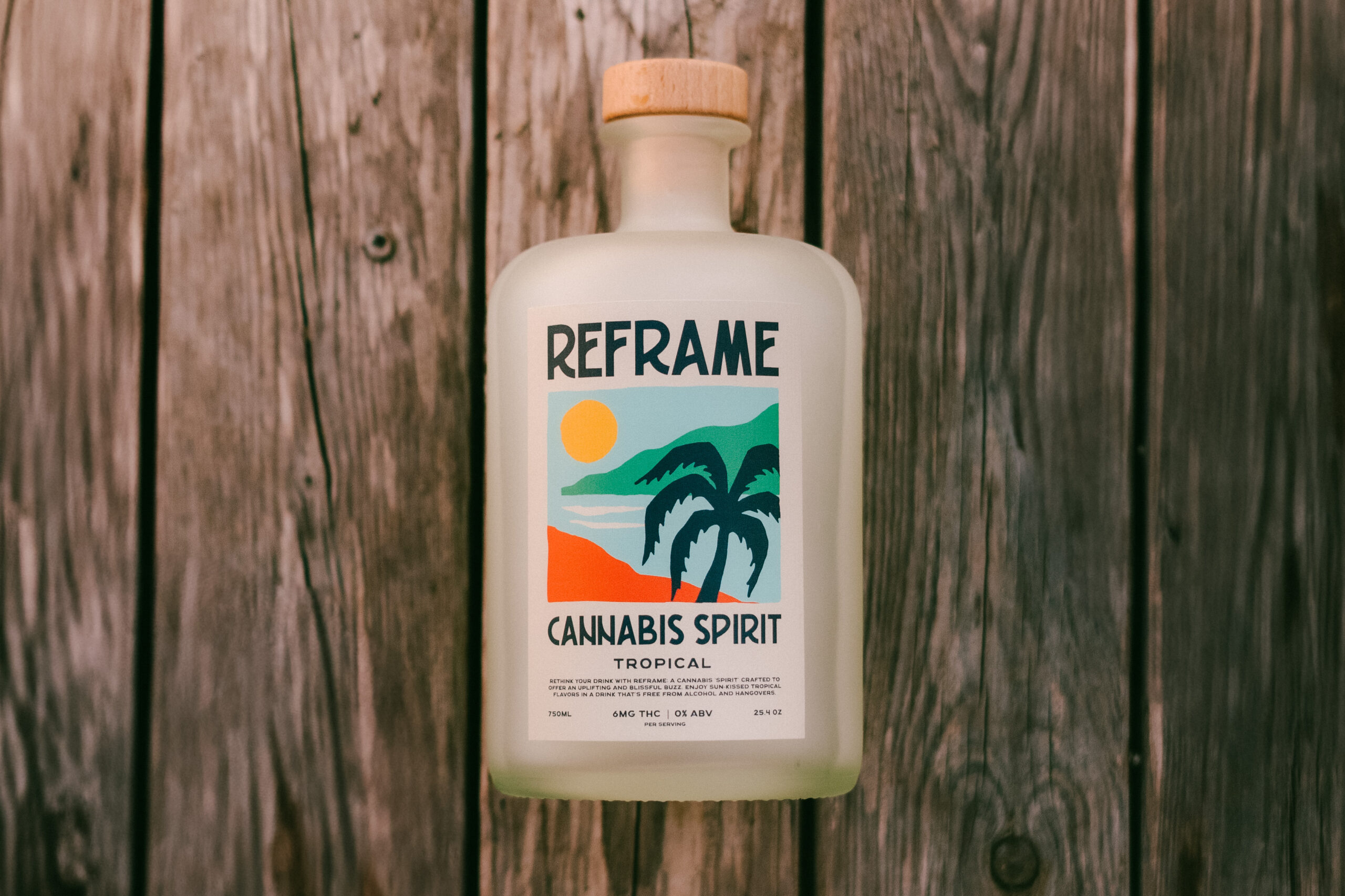 Reframe 720ml cannabis spirit bottle on a dock